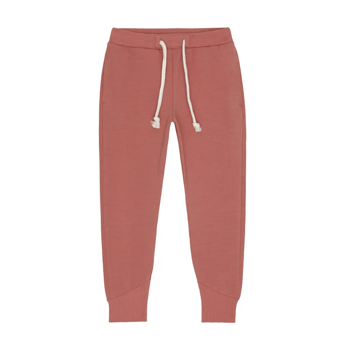 Little Hedonist skinny sweatpants in coral for boys and girls. Sustainable kids clothing made from organic cotton.