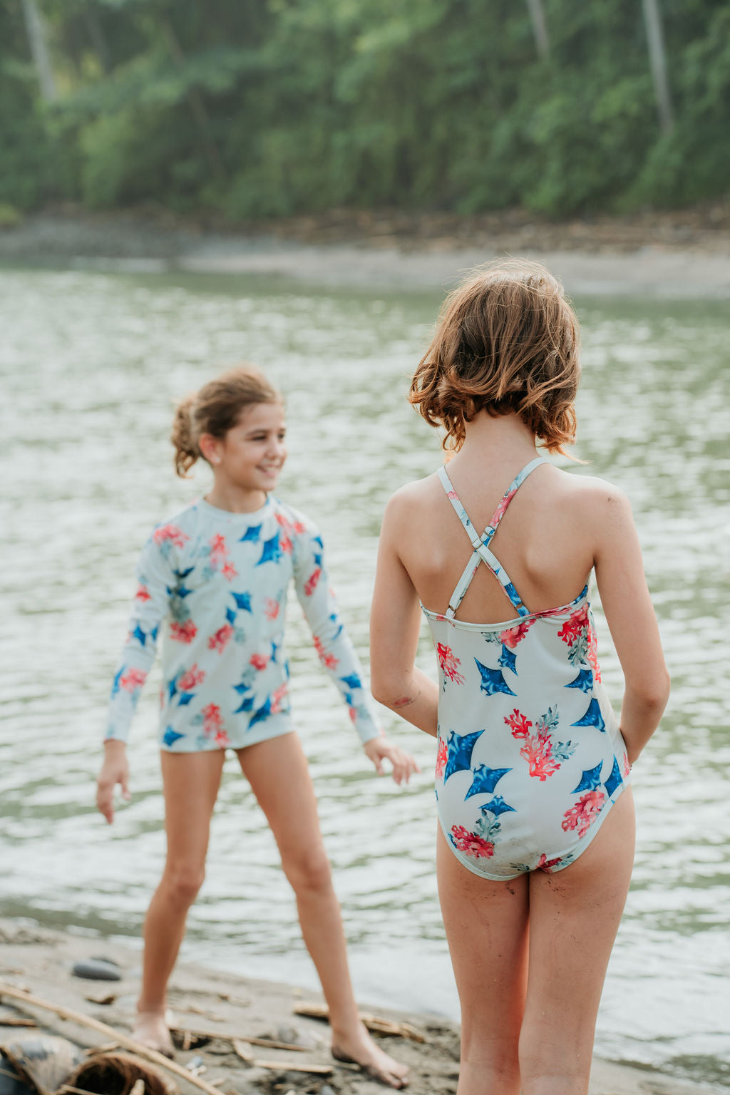 Two girls in Little Hedonist organic swimwear