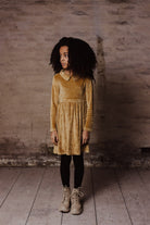 Little Hedonist fancy thick and warm organic long-sleeve dress for all occasions, in gold. Sustainable kids fashion for boys and girls.