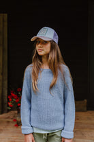 Extremely soft and warm blue organic knitted sweater by Little Hedonist