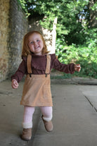 Little Hedonist comfortable, yet fancy, Iced Coffee dress with suspenders, to be worn for any occasion. Organic kids fashion.