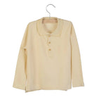 Little Hedonist organic beige longsleeve polo shirt with collar and buttons on the front.