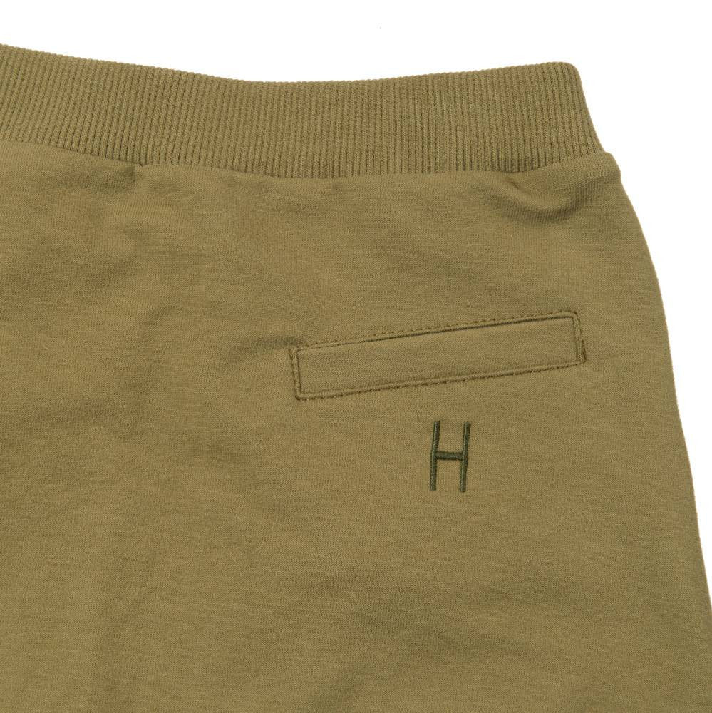 Just a comfy Little Hedonist sweatpants in Olive Drab. But then at the same time a bit more then JUST a sweatpants. A couture basic. The low crotch makes it fashionable to see and real comfy to wear. Pockets to hide your treasures in. Raw edged legs.