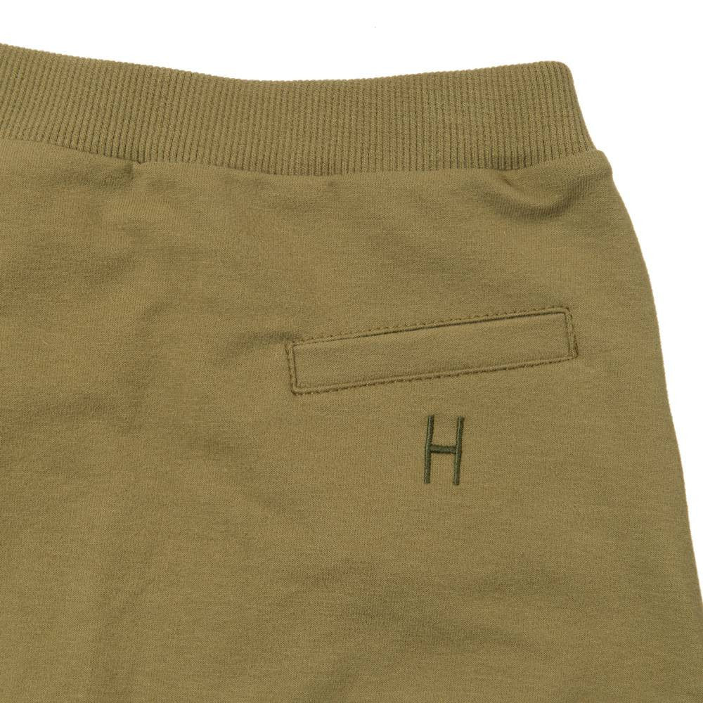 Just a comfy Little Hedonist sweatpants in Olive Drab. But then at the same time a bit more then JUST a sweatpants. A couture basic. The low crotch makes it fashionable to see and real comfy to wear. Pockets to hide your treasures in. Raw edged legs.