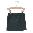 This every day Little Hedonist skirt is made of the softest material. The rib waistband is comfortable and does not irritate. Raw edged bottom.