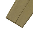 Little Hedonist organic track pants with a skinny cut in olive