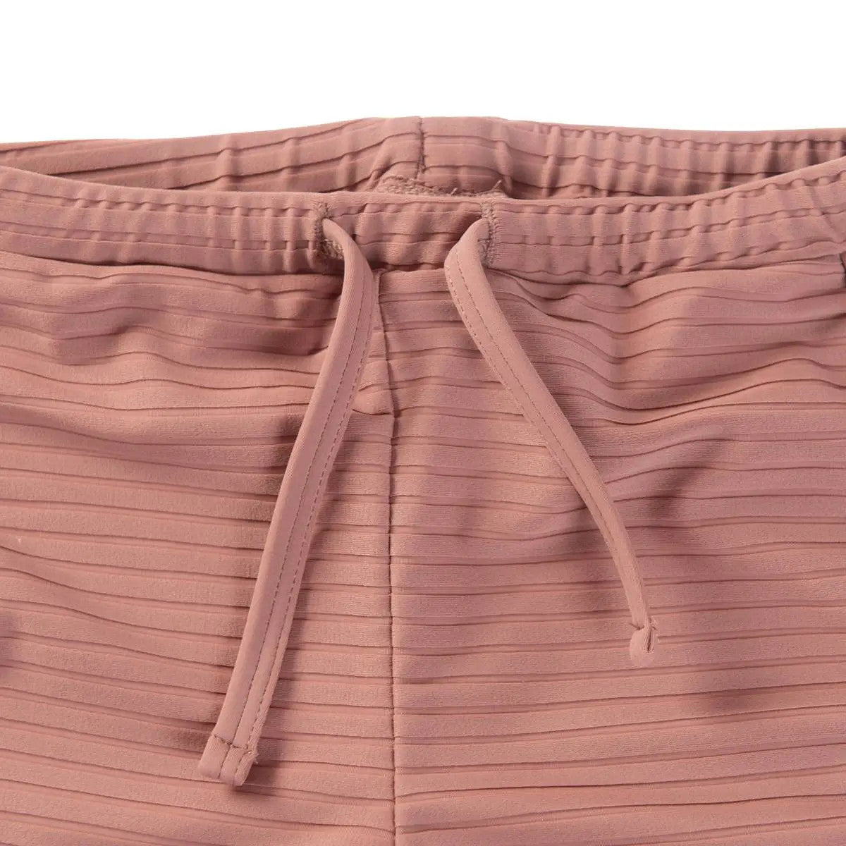 Little Hedonist unisex swim shorts made of recycled polyamide, in Burlwood Pink