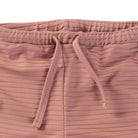 Little Hedonist unisex swim shorts made of recycled polyamide, in Burlwood Pink